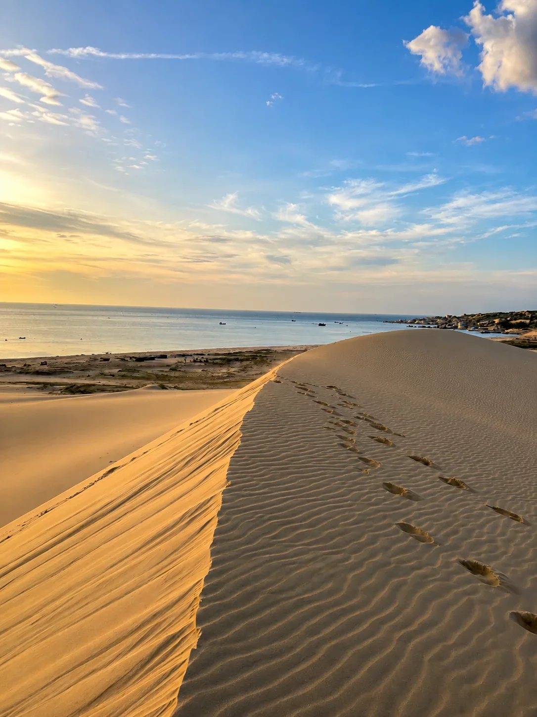 Sand dunes meeting the sea near Mui Ne