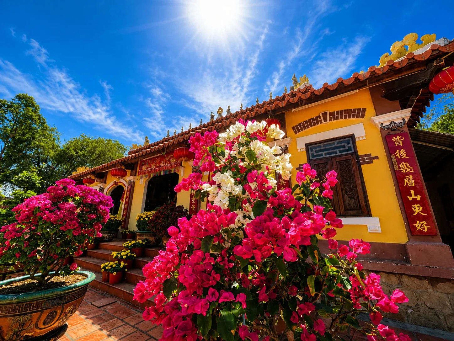 Buddhist temple with bougainvillea in southern Vietnam
